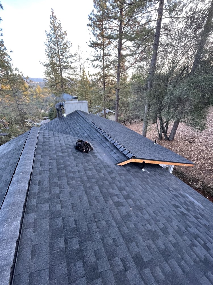 Slide of JMK Roofing