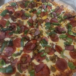 Meat Lovers Pizza with green peppers added