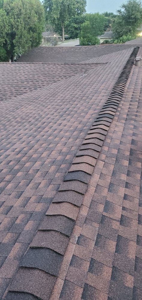 Slide of 2 Angels Roofing