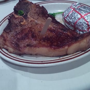 Timbermine Steakhouse - This is my $30 t-bone that was ordered med rare and came out med well. NOT impressed @ all. Prairie Schooner; much better option - Steakhouses Near Me - Ogden, Utah