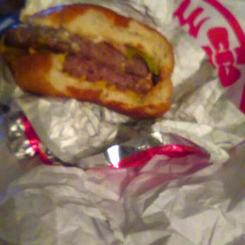Wendy's - I ordered "Dave's Hot&juicy" which is a triple. As you can see above, I am eating a double burger, but I paid for the triple. Fail! - Burgers Near Me - Stockton, California