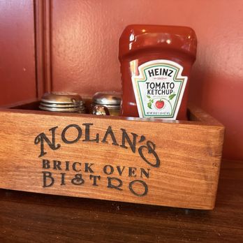 Nolan's Brick Oven Bistro - Condiment caddy at the table - Cafes Near Me - Wolfeboro, New Hampshire