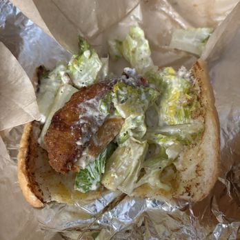 Buona - Corporate greed. Half a piece of chicken barely even covers half the tiny piece of bread. - Sandwiches Near Me - Oak Lawn, Illinois