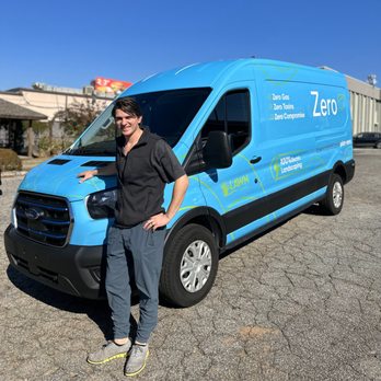 Lawn Capital - Owner Greyson Walldorff in front of our first electric van! - Lawn Services Near Me - Decatur, Georgia Lawn Capital - Owner Greyson Walldorff in front of our first electric van! - Lawn Services Near Me - Decatur, Georgia