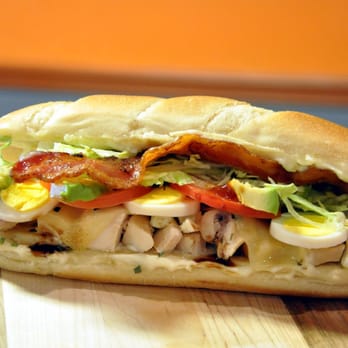 Sammies - a chicken sandwich on a cutting board - Sandwiches Near Me - Union City, Tennessee Sammies - a chicken sandwich on a cutting board - Sandwiches Near Me - Union City, Tennessee
