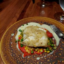 Potato crusted cod, with fresh succotash, piquillo pepper puree, and lemon buerre blanc. Potato crusted cod, with fresh succotash, piquillo pepper puree, and lemon buerre blanc.
