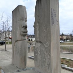Red, Blonde, Black, and Olive - Each of the blocks has two face halves representing world races