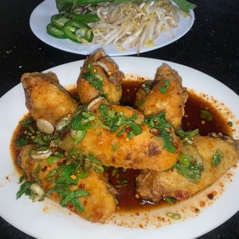 Pho 79 - The wings super crispy topped with a delicious fish sauce. - Vietnamese Near Me - Boynton Beach, Florida Pho 79 - The wings super crispy topped with a delicious fish sauce. - Vietnamese Near Me - Boynton Beach, Florida
