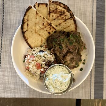Sago - Greek slow cooked Lamb with Mediterranean couscous and house made tzatziki. - American Near Me - St. Simons, Georgia