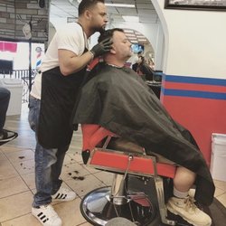 The Classic Barber Shop - Concentration at its finest.