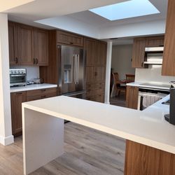New Level Stone & Tile - kitchen countertop and waterfall