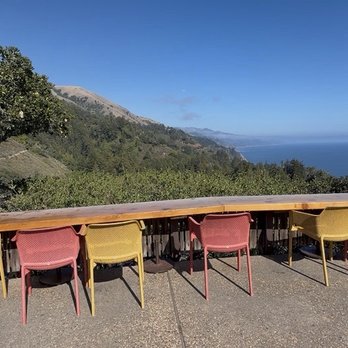 Nepenthe - Beautiful outdoor seating with overlooking the Pacific Ocean. - New American Near Me - Big Sur, California Nepenthe - Beautiful outdoor seating with overlooking the Pacific Ocean. - New American Near Me - Big Sur, California