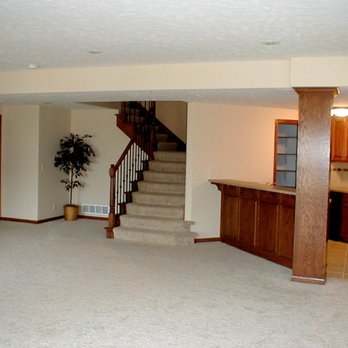 FRED Construction - an empty living room with stairs - General Contractors Near Me - Chicago, Illinois