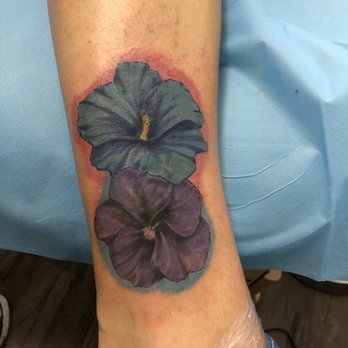 Resilience Tattoo Collective - My new tattoo of hibiscus flowers. I love them - Tattoo Near Me - Colton, California Resilience Tattoo Collective - My new tattoo of hibiscus flowers. I love them - Tattoo Near Me - Colton, California
