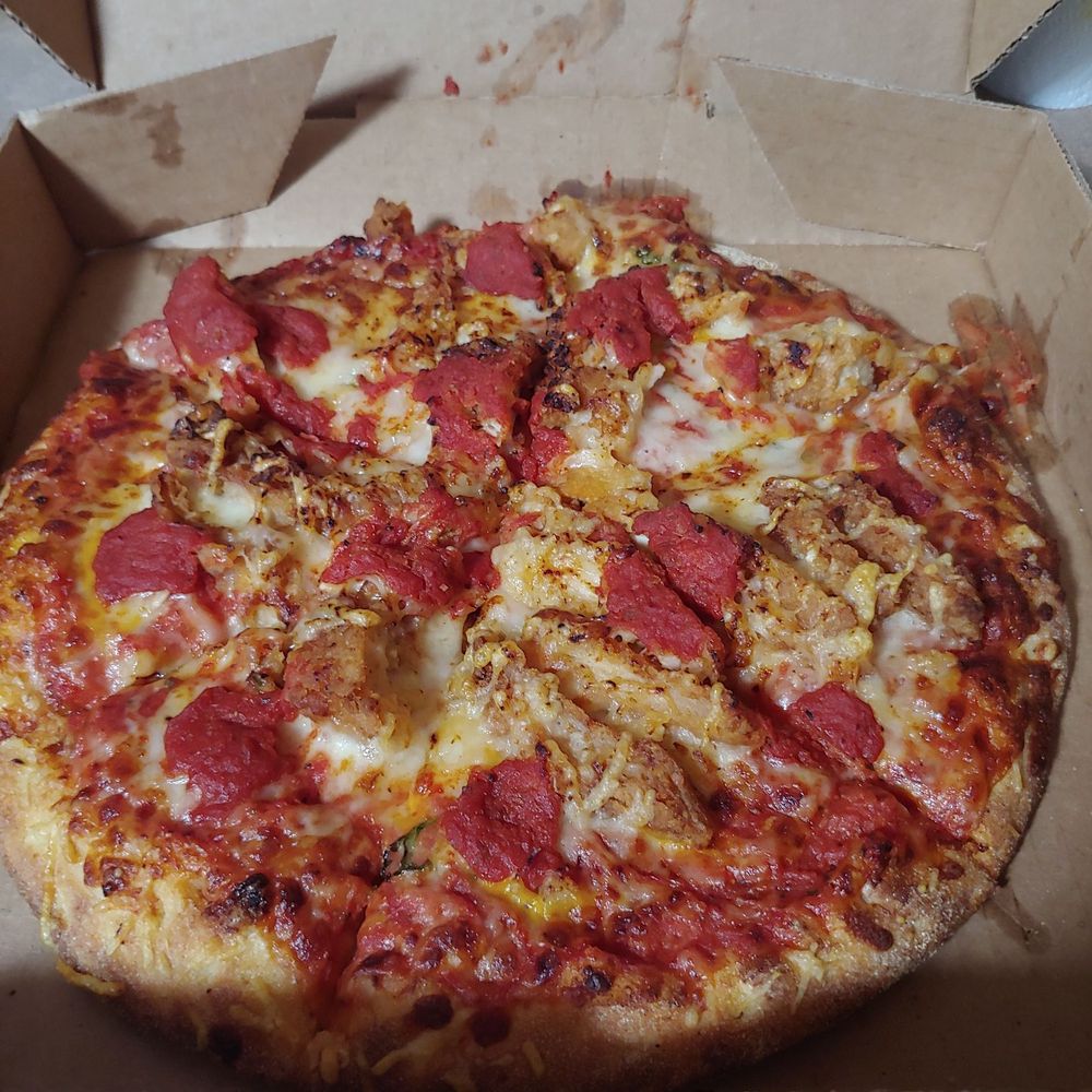 Chicky chicky parm parm, 10 inches. Was supposed to be on a thin crust but came out as regular crust. Chicky chicky parm parm, 10 inches. Was supposed to be on a thin crust but came out as regular crust.