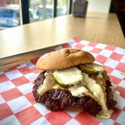 605 Smash - Single smashburger with pickles, grilled onions, and secret sauce.
