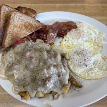 Sunshine Cafe - Wheat toast , over easy eggs, bacon and home fries with sausage gravy . - Breakfast & Brunch Near Me - Niagara Falls, New York