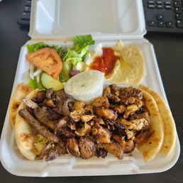 #1 Lunch special - Chicken Shawarma, Beef Shawarma, hummus, rice and Greek salad #1 Lunch special - Chicken Shawarma, Beef Shawarma, hummus, rice and Greek salad