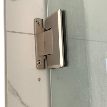 Adams Custom Cabinetry - holes in brand new tile from incorrect install - Cabinetry Near Me - Lakewood, Colorado