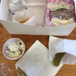 Scottzers Scratch Bakery & Box Lunches - Pastrami sandwich with pickle, cookie, water, potato salad and chips