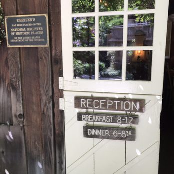Deetjen's Restaurant - The door indicates times for breakfast and dinner. - American Near Me - Big Sur, California