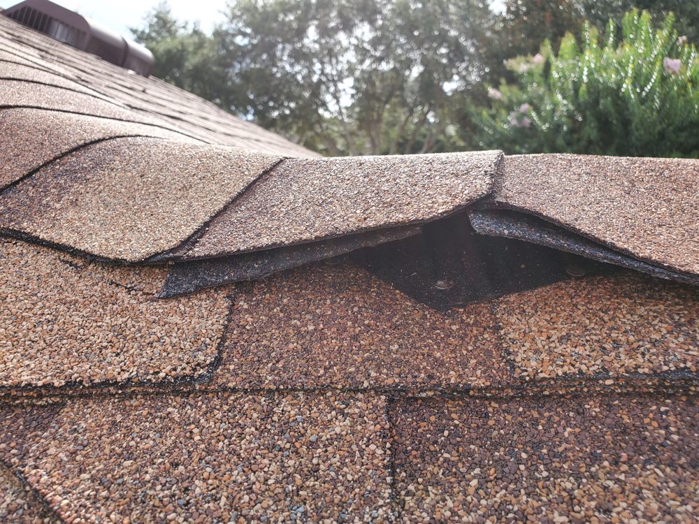 Slide of Clermont Roofing