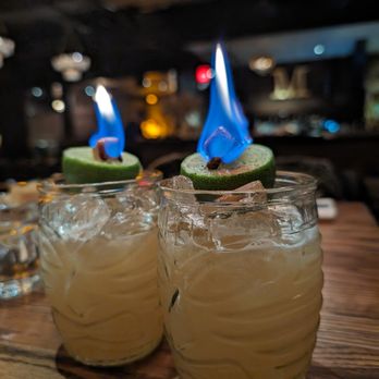 Mister M - two glasses of margarita with lime slices - Cocktail Bars Near Me - Calgary, Alberta Mister M - two glasses of margarita with lime slices - Cocktail Bars Near Me - Calgary, Alberta