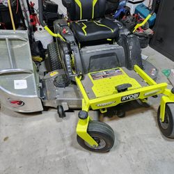 Dan's Lawnmower Center - Mower with catcher attached.