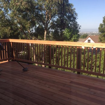 Montclair Construction & Structural - Day of deck completion, you can see final clean up underway. - General Contractors Near Me - Oakland, California