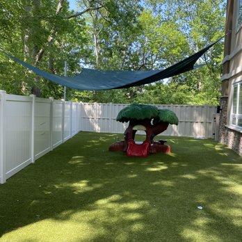 Strader Lawn Services - a hammock in a backyard - Lawn Services Near Me