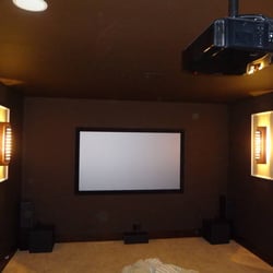 Capitol Audio Video - Custom home theater room design and installation. JVC X10 projector, screen innovations black diamond, revel audio system.