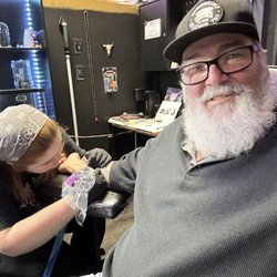Black Orchid Tattoo Studio - Me getting my tattoo