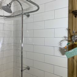 Weldon's Remodeling - New tile work to properly cover the tub/shower combo in the bathroom.