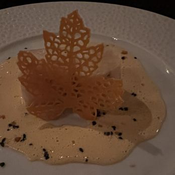 La Toque - Scallop in Uni Emulsion with a Carrot leaf chip - French Near Me - Napa, California La Toque - Scallop in Uni Emulsion with a Carrot leaf chip - French Near Me - Napa, California