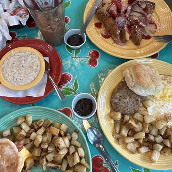 The Flying Biscuit Cafe - Chicken sausage gravy, breakfast sandwhich, strawberry cheesecake stuffed French toast, moon dusted potatoes, biscuit - Breakfast & Brunch Near Me - Atlanta, Georgia The Flying Biscuit Cafe - Chicken sausage gravy, breakfast sandwhich, strawberry cheesecake stuffed French toast, moon dusted potatoes, biscuit - Breakfast & Brunch Near Me - Atlanta, Georgia