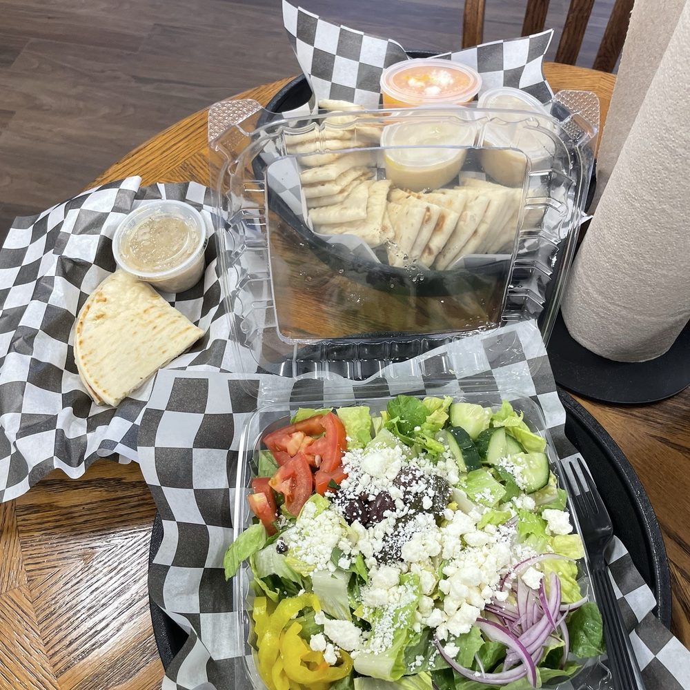Greek salad Hummus trio Greek salad Hummus trio