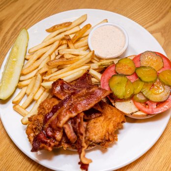 Riley & Jake's - a plate of fried chicken, french fries, pickles, and a pickle - American Near Me - Clinton, New Jersey Riley & Jake's - a plate of fried chicken, french fries, pickles, and a pickle - American Near Me - Clinton, New Jersey