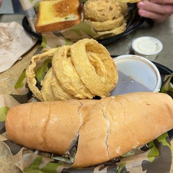 Bubba's Grill and Catering - roast beef poboy and onion rings in front. club and onion rings in the back. - American Near Me - Walker, Louisiana