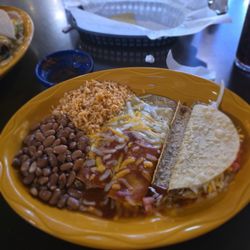 Rubia's - Tampico with 2 cheese enchiladas Christmas style, a crunchy corn ground beef taco, whole pinto beans and rice