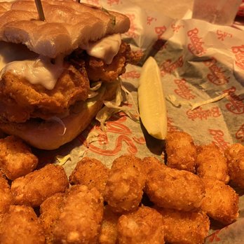 Bubba's 33 - Buffalo chicken sandwich with tots was pretty good. Tender chicken - Burgers Near Me - Fayetteville, North Carolina