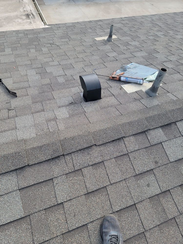 Slide of Over & Above Roofing
