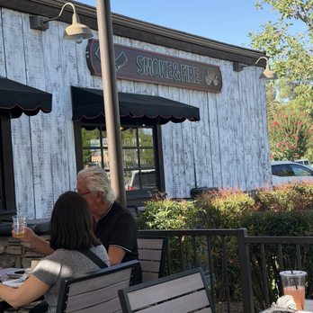 Smoke & Fire Social Eatery - Outside eating area and the trash can at the door to the left, not shown in picture. - Barbeque Near Me - Riverside, California Smoke & Fire Social Eatery - Outside eating area and the trash can at the door to the left, not shown in picture. - Barbeque Near Me - Riverside, California
