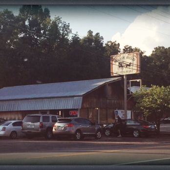 Buggy Shed - cars parked in front of it - American Near Me - Beechmont, Kentucky