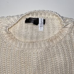 A-1 Dry Cleaners - Makeup around the neck of the sweater