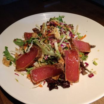 Yard House - Ahi Crunchy Salad* Seared rare, field greens, asian slaw, crispy wontons, soy vinaigrette. (cal 380 / 710) - New American Near Me - Orlando, Florida Yard House - Ahi Crunchy Salad* Seared rare, field greens, asian slaw, crispy wontons, soy vinaigrette. (cal 380 / 710) - New American Near Me - Orlando, Florida