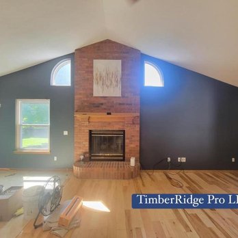 TimberRidge Pro - a fireplace in the middle of a room - General Contractors Near Me TimberRidge Pro - a fireplace in the middle of a room - General Contractors Near Me