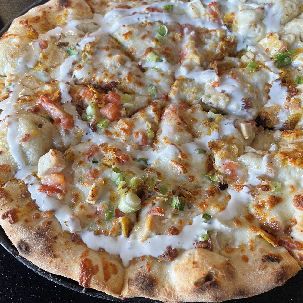 a close up of a pizza