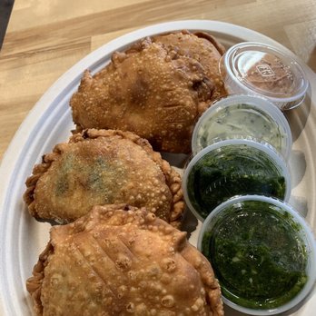 Johnny Pacific - bout to dig in these empanadas and sauce action. - Latin American Near Me - Winnetka, California