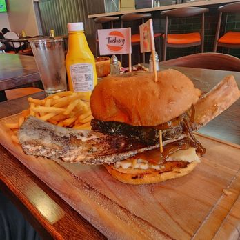 Tacburg - Flintstones Burger - as advertised and tastes amazing. Served with fries - Tacos Near Me - Whittier, California