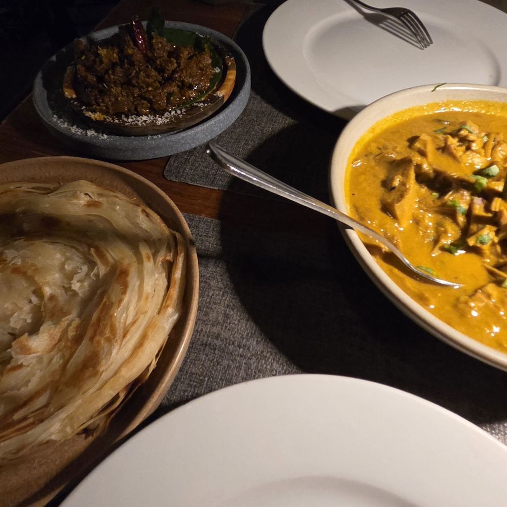 Lungi - Malabar parotta, jackfruit curry and mutton liver fry - Cocktail Bars Near Me - New York, New York Lungi - Malabar parotta, jackfruit curry and mutton liver fry - Cocktail Bars Near Me - New York, New York